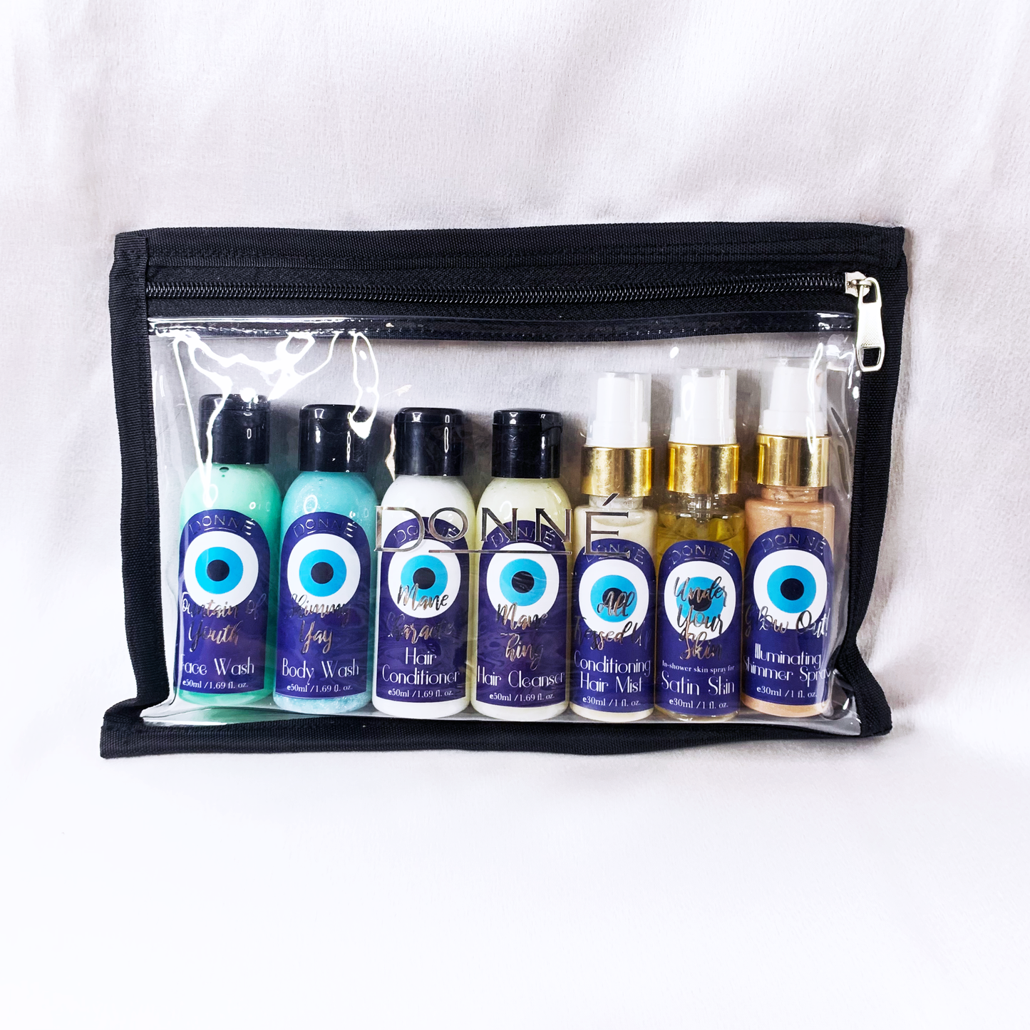 Travel Kit packaged with face wash, body wash, conditioner, shampoo, moisturising spray shimmer spray and a hair serum mist