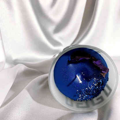 Royal blue scented candle for strong floral based fragrance decor view with potpourri, crushed glass, glitter